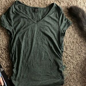 This is a SHEIN top color green and it is a size M 38